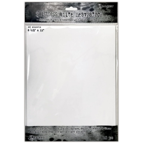 A single pack of Tim Holtz Distress Heavystock White is shown vertically, in the center of the frame. The paper is in a clear plastic bag, with a printed header and footer. The Header has the Distress logo and product name printed on it. You can see the paper through the packaging. The top header has a hang tab that allows the pack to be hung. The image is center of the frame and on a white background.