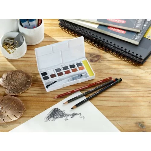 Derwent Shade & Tone Watercolour Paint Pan Set open with pencils on desk