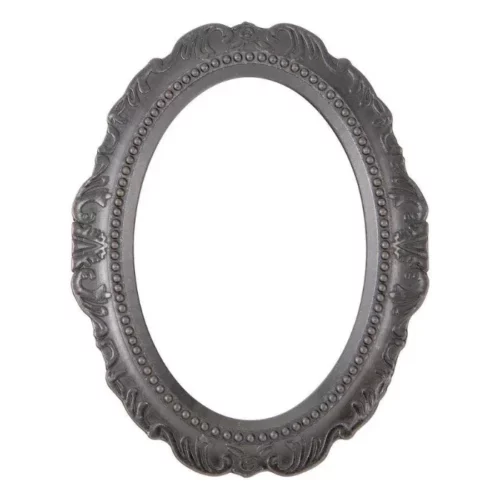 The ornate, oval frame from a pack of Tim Holtz Idea-ology The Manor is shown in the center of the frame. On a white background.