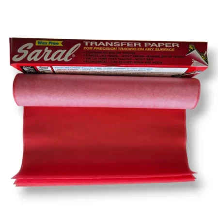 A long rectangular box is shown at an angle behind a roll of Saral Wax Free Transfer Paper Roll Red. The transfer roll is slightly unwound and is blue on white side and white on the other. The image is center of the frame and on a white background.