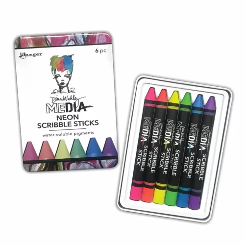 There is an open set of Dina Wakley Media Neon Scribble Sticks shown in the center of the frame. The tin lid is to the left of the tin base. The base houses the 6 neon sticks. Each stick is a colour and has a black label around the stick with the colour name and brand name printed on it. The lid is white and has the Dina Wakley logo printed on it with the product name. An image of the tips of the sticks is shown at the bottom of the tin. On a white background.