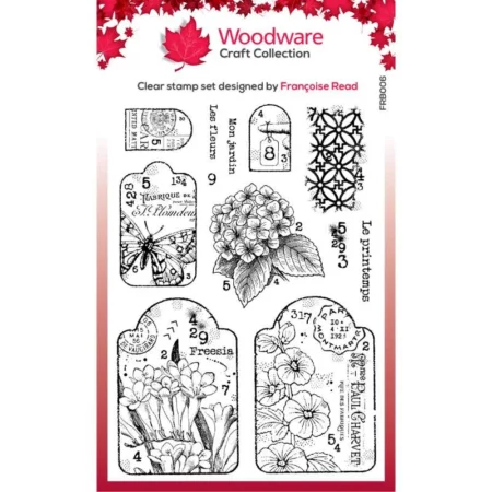 A single Garden Tags Woodware Clear Stamp Set is shown in the center of the frame. The set has a printed cardboard backing with the Jane Davenport logo. The images of the stamp are printed on the front in colour. On a white background.