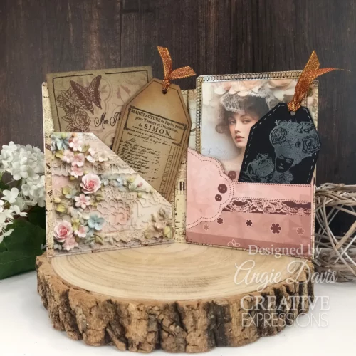 A project that was made using the Ledger Creative Expressions Clear Stamp Set. It is an altered art papercraft project that is vintage styled and displayed on a wooden slice.