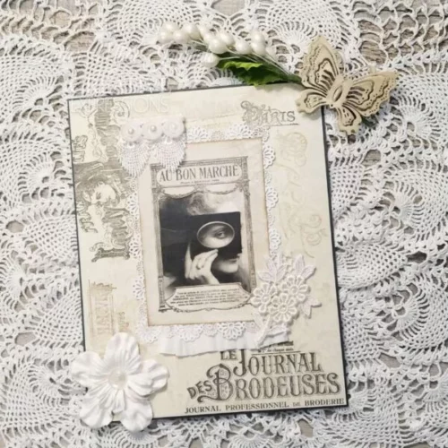 A project that was made using the Mode De La Paris Creative Expressions Clear Stamp Set. The project is vintage themed and neutral in colour.