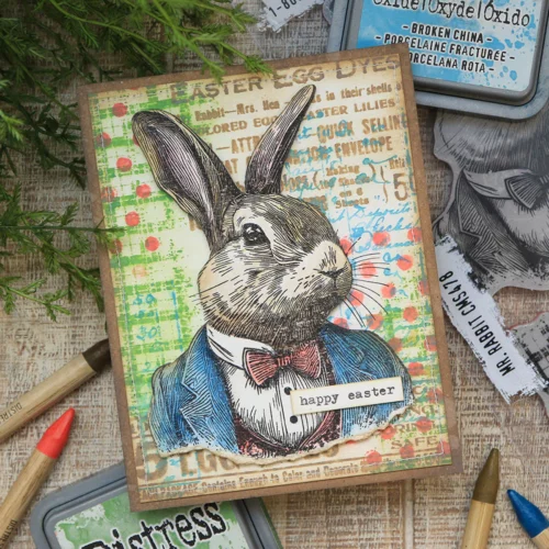 A card that was made using the Mr Rabbit Tim Holtz Stamp Set is shown in the frame.