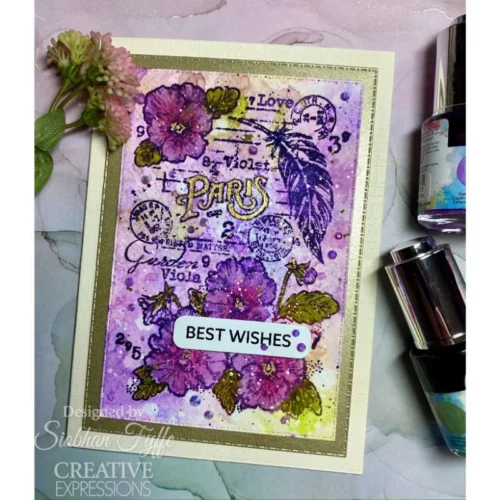 A greeting card was made using the Viola Woodware Clear Stamp Set. The card is purple and green and the flowers have been coloured in.