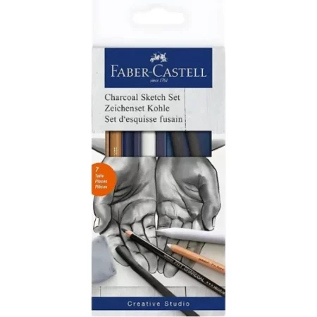 A Faber Castell Charcoal Sketch Set is shown standing vertically in the center of the frame. The set is in a cardboard box with a hang tab top. The box is white and has a picture of two hands opened out on the cover with some pencils shown over the hands. There is text at the top of the packaging. The image is center of the frame and on a white background.