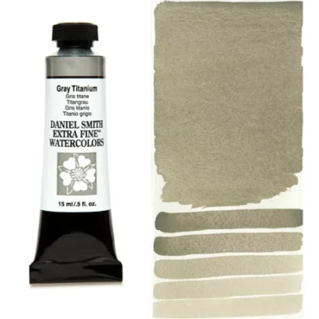 A tube of grey titanium Daniel Smith Watercolour Paint is shown in the frame, to the left hand side of the frame vertically. The tube has a black plastic cap and a black base. The center of the tube is white and there is a colour band at the top of the tube, below the cap, that indicates the colour of the paint. There is black text on the front of the tube with the brand name and logo. To the right of the tube is a colour swatch which was made using the paint. In the colour swatch, you can see the paint undiluted and in a diluted form. The image is on a white background and is center of the frame.