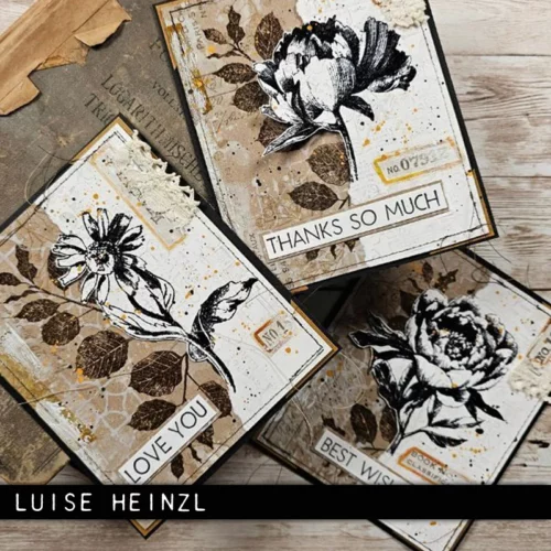 Three vintage styled cards that were made using the French Garden Tim Holtz Stamp Set are shown in the frame. They have a neutral background and flowers stamped on the fronts using black ink. Each card has a sentiment. The image is cut off by the frame.