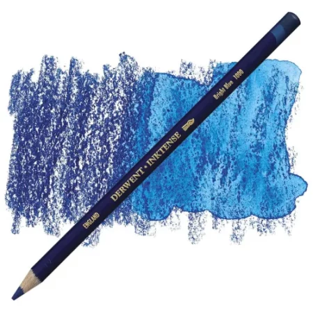 A single Bright Blue Derwent Inktense Colour Pencil is shown diagonally across the center of the frame. The pencil is pointing with it's lead facing towards the bottom left hand corner. The barrel of the pencil is blue and the end of the pencil is colour dipped to match the colour of the lead for easy identification. There is text down the barrel of the pencil with the colour name and brand name. There is a colour swatch of the pencil in the background, that runs horizontally across the center of the frame. The image is center of the frame and on a white background.