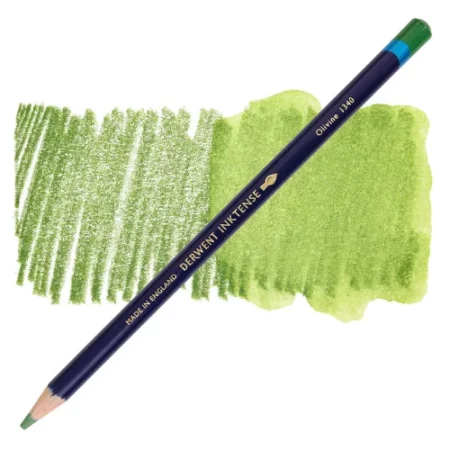 A single Olivine Derwent Inktense Colour Pencil is shown diagonally across the center of the frame. The pencil is pointing with it's lead facing towards the bottom left hand corner. The barrel of the pencil is blue and the end of the pencil is colour dipped to match the colour of the lead for easy identification. There is text down the barrel of the pencil with the colour name and brand name. There is a colour swatch of the pencil in the background, that runs horizontally across the center of the frame. The image is center of the frame and on a white background