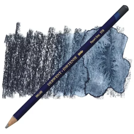 A single Paynes Grey Derwent Inktense Colour Pencil is shown diagonally across the center of the frame. The pencil is pointing with it's lead facing towards the bottom left hand corner. The barrel of the pencil is blue and the end of the pencil is colour dipped to match the colour of the lead for easy identification. There is text down the barrel of the pencil with the colour name and brand name. There is a colour swatch of the pencil in the background, that runs horizontally across the center of the frame. The image is center of the frame and on a white background.