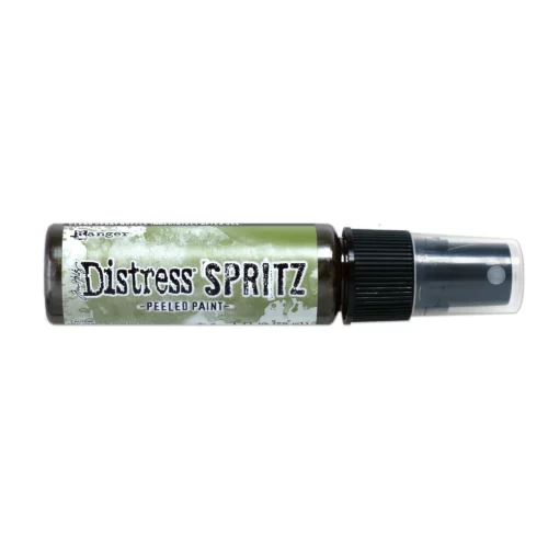 A single bottle of Peeled Paint Tim Holtz Distress Spritz is shown laying horizontally in the center of the frame. The bottle is a clear plastic with a black plastic spray top and a clear plastic lid. There is a coloured label around the body of the bottle that indicates the colour of the ink. The Distress Logo and product details are printed on the label. The image is center of the frame and on a white background.