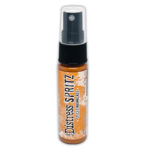 A single bottle of Spiced Marmalade Tim Holtz Distress Spritz is shown standing vertically in the center of the frame. The bottle is a clear plastic with a black plastic spray top and a clear plastic lid. There is a coloured label around the body of the bottle that indicates the colour of the ink. The Distress Logo and product details are printed on the label. The image is center of the frame and on a white background.