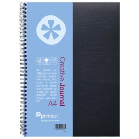 A single A4 Prime Art Soft Cover Creative Journal is shown standing vertically in the center of the frame. The journal has a black cover and a paper insert that is attached to the wiro bound on the front of the cover. The paper insert is blue and has the prime art logo and text describing the product. The wiro bound is along the left hand side of the frame. The image is center of the frame and on a white background.