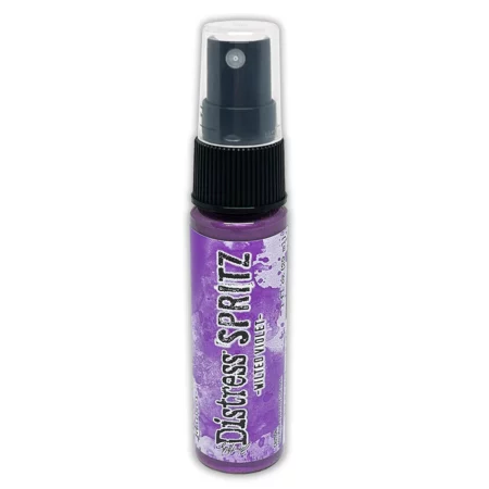 A single bottle of Wilted Violet Tim Holtz Distress Spritz is shown standing vertically in the center of the frame. The bottle is a clear plastic with a black plastic spray top and a clear plastic lid. There is a coloured label around the body of the bottle that indicates the colour of the ink. The Distress Logo and product details are printed on the label. The image is center of the frame and on a white background.