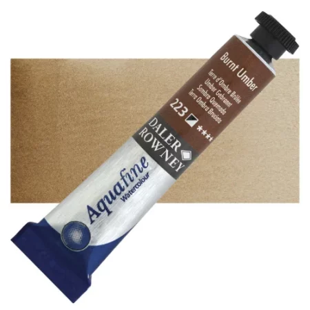 Burnt Umber Daler Rowney Aquafine Watercolour is sitting horizontally across the image with the lid facing the top right corner. it has a black lid and a blue bottom end. the name of the product is on the top middle of the tube, it is lying across a horizontal strip of the same colour that is in the center of the image. On a white background.