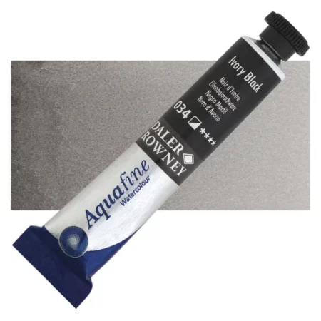 Ivory Black Daler Rowney Aquafine Watercolour is sitting horizontally across the image with the lid facing the top right corner. it has a black lid and a blue bottom end. the name of the product is on the top middle of the tube, it is lying across a horizontal strip of the same colour that is in the center of the image. On a white background.