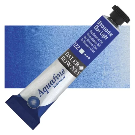 Ultramarine Blue Light Hue Daler Rowney Aquafine Watercolour is sitting horizontally across the image with the lid facing the top right corner. it has a black lid and a blue bottom end. the name of the product is on the top middle of the tube, it is lying across a horizontal strip of the same colour that is in the center of the image. On a white background.