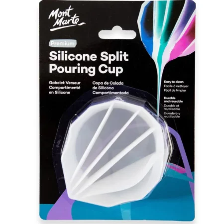 A Mont Mont Marte Silicone Split Pouring Cup is shown vertically in the center of the frame, in it's packaging. The cup is white plastic and in a rounded 'v' shape. It has 4 divisions for paint. The packaging is a hang tab with a cardboard backing that is printed and a clear plastic moulded top so you can see the cup through the packaging.