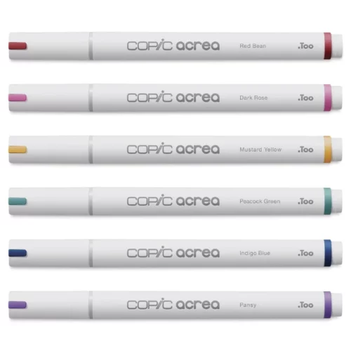 The loose markers from the Copic Acrea Paint Marker Set Deep are shown laying horizontally in the center of the frame. The markers are white with a coloured band on the lid and at the base of each marker that denotes the colour of the marker. The Copic logo is printed on the barrel of each marker with the marker colour. They are stacked one below the other and there are 6 markers. On a white background.