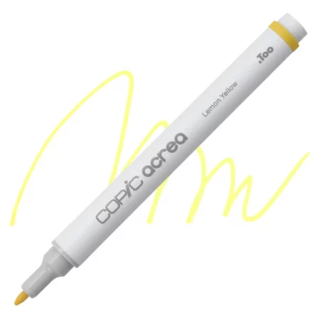 lemon yellow Copic Acrea Paint Marker is sitting diagonally across the image. the tip is facing the left hand side . it has a white body and a silver end with a white tip. it is sitting over a squiggle of the same colour on a white background