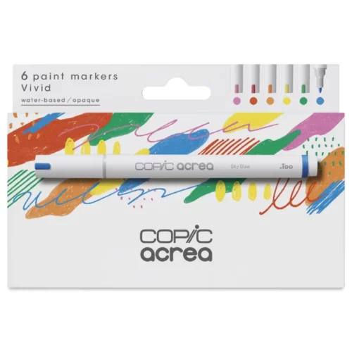 A Copic Acrea Paint Marker Set Vivid is shown diagonally in the center of the frame, so you can see the front of the box and one side. There is a picture of a marker on the box and the Copic Acrea logo in the bottom, center of the box. The box is white white an image of coloured triangles printed on it. On a white background.