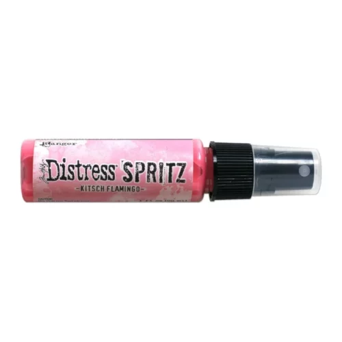 A single bottle of Kitsch Flamingo Tim Holtz Distress Spritz is shown laying horizontally in the center of the frame. The bottle is a clear plastic with a black plastic spray top and a clear plastic lid. There is a coloured label around the body of the bottle that indicates the colour of the ink. The Distress Logo and product details are printed on the label. The image is center of the frame and on a white background.