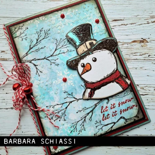 The image shows a craft project that was made using the Mr Frostie Tim Holtz Stamp Set.