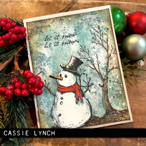 The image shows a craft project that was made using the Mr Frostie Tim Holtz Stamp Set.