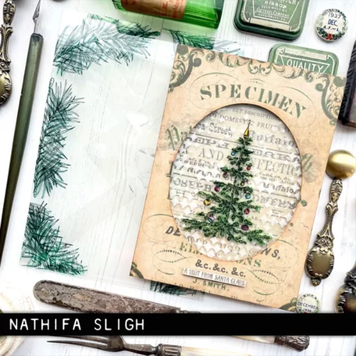 The image shows a craft project that was made using the Santa Visit Tim Holtz Stamp Set.