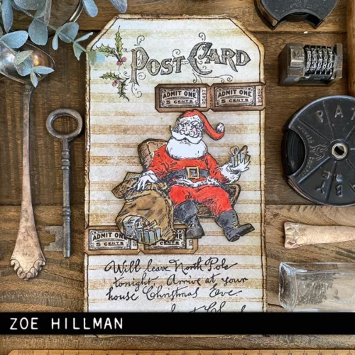 The image shows a craft project that was made using the Santa Visit Tim Holtz Stamp Set.