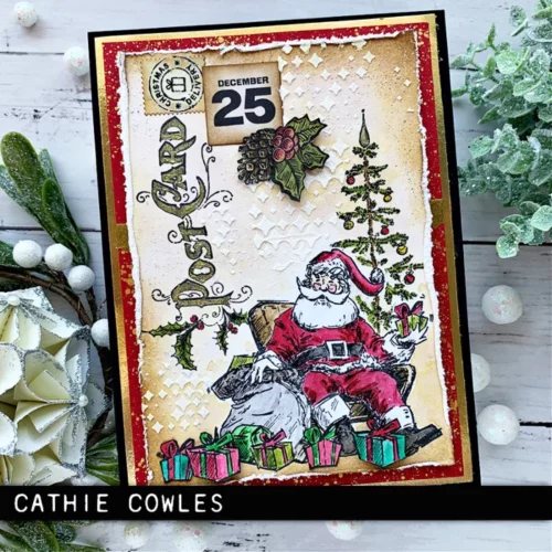 The image shows a craft project that was made using the Santa Visit Tim Holtz Stamp Set.