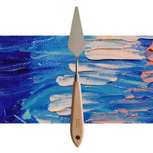 A single Prime Art Palette Knife PK03 is shown vertically, in the center of the frame. The palette knife has a shaped metal blade and a wooden handle. The Prime Art name is printed on the wooden handle. The image is center of the frame and on a textured blue and pink background.